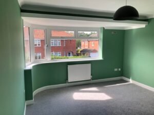 Whole-Home Decorating with Green and Navy Interiors