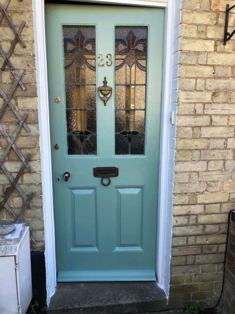 Period Front Door Repainting in Muted Teal
