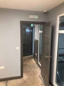 Commercial Corridor and Door Repainting in Grey