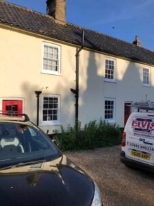 Cream Cottage Exterior Painting