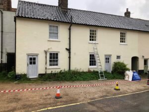 Cream Cottage Exterior Painting