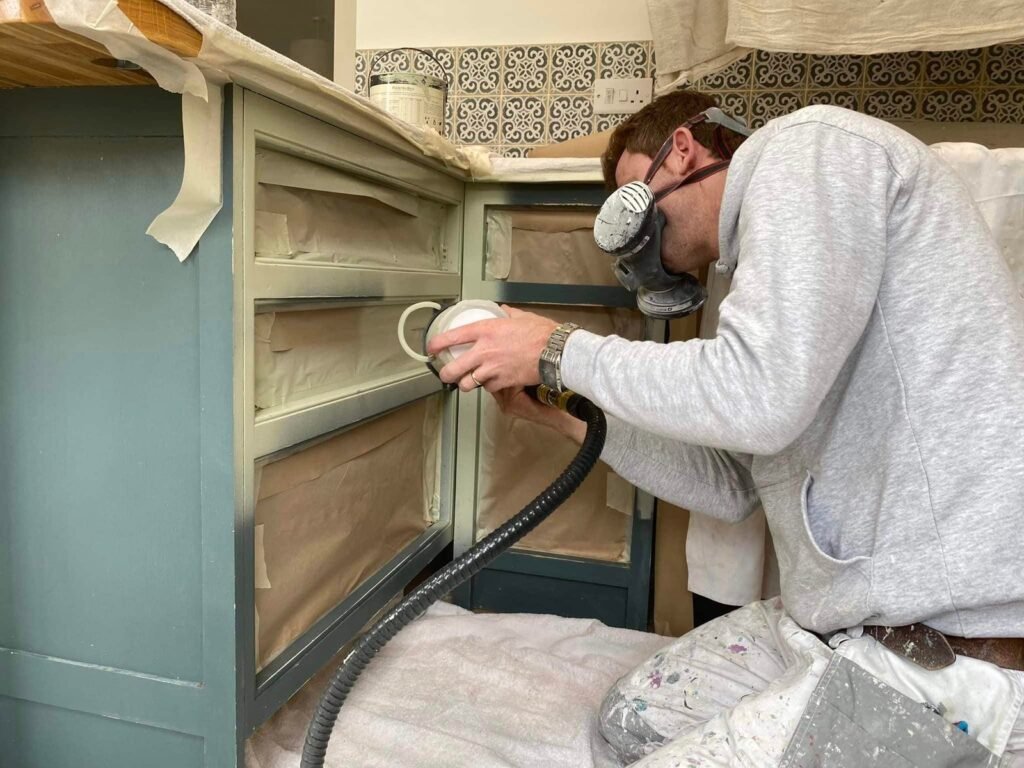Kitchen Cabinet Repainting with Blue and Muted Green Finishes