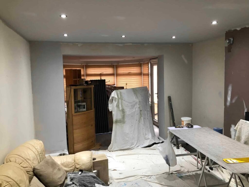 Living Room Wallpapering with a Textured Grey Finish