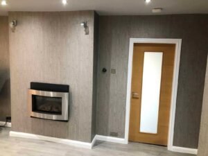 Living Room Wallpapering with a Textured Grey Finish
