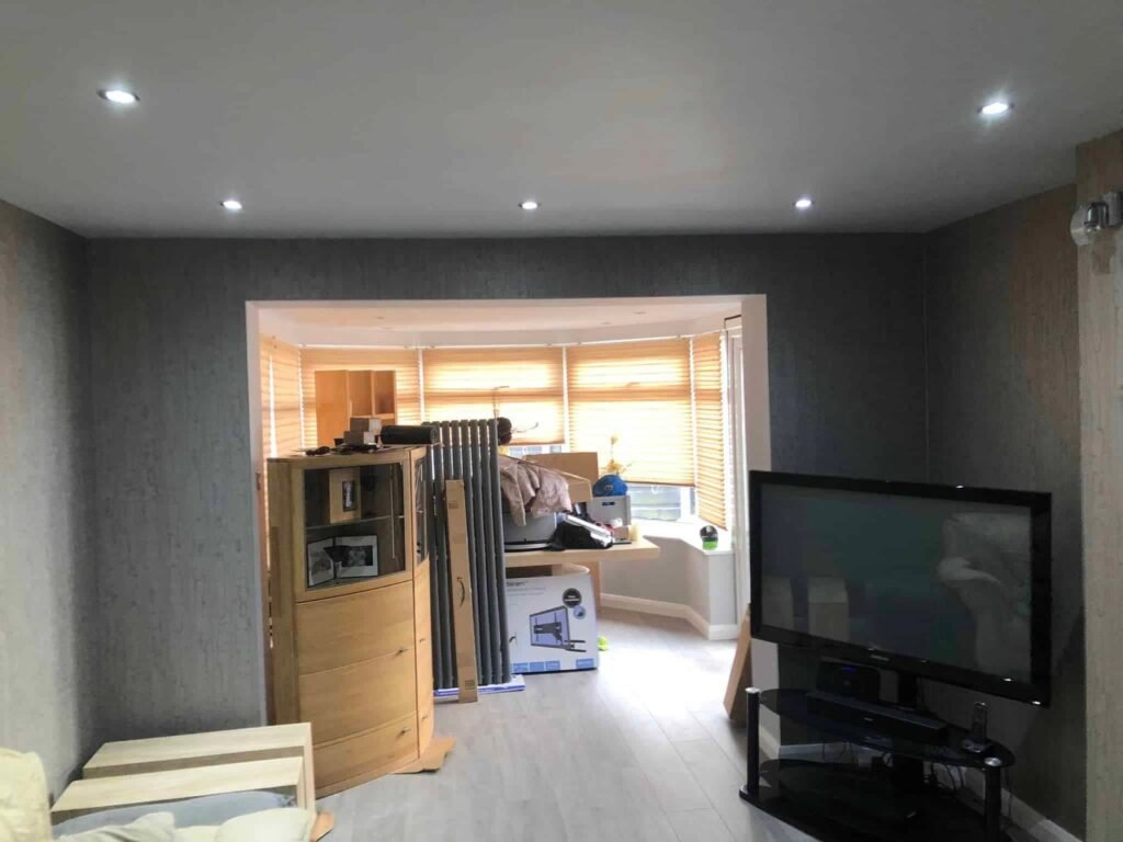 Living Room Wallpapering with a Textured Grey Finish
