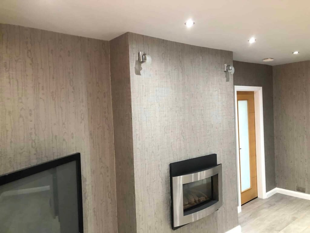 Living Room Wallpapering with a Textured Grey Finish