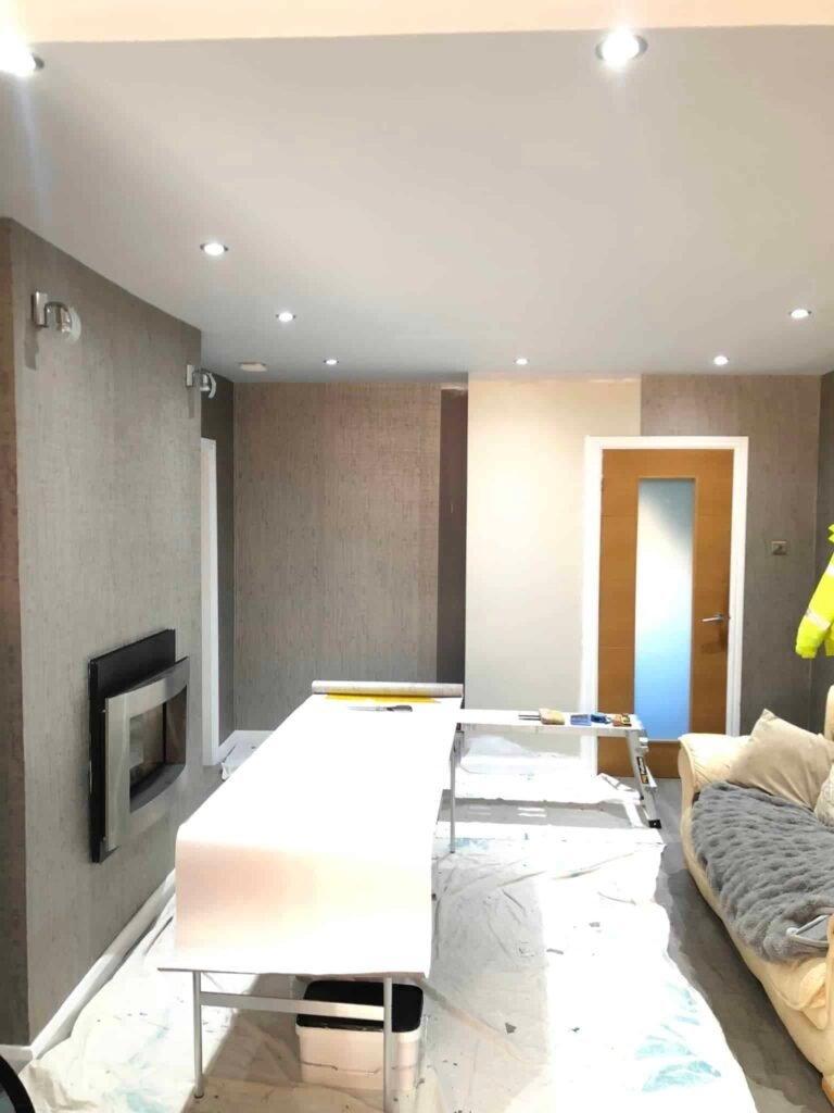 Living Room Wallpapering with a Textured Grey Finish