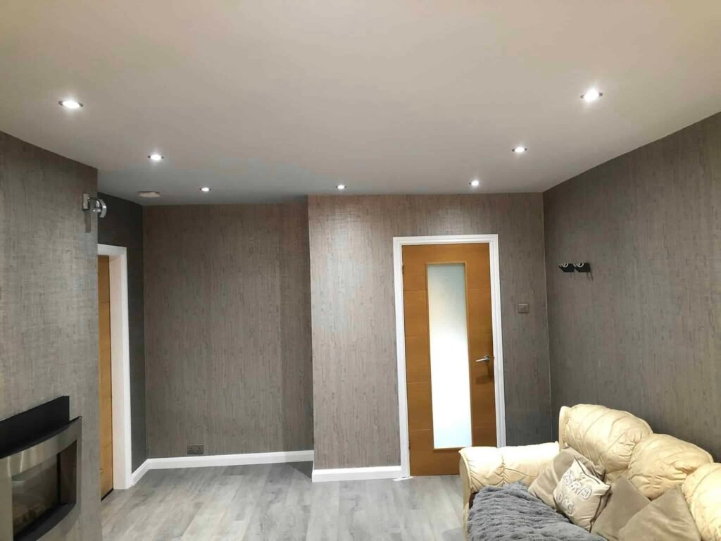 Living Room Wallpapering with a Textured Grey Finish