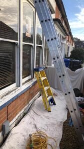 Exterior Render, Bay Window and Front-Door Redecoration