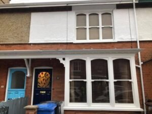 Exterior Render, Bay Window and Front-Door Redecoration