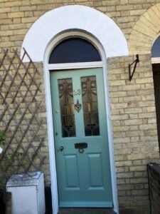 Period Front Door Repainting in Muted Teal