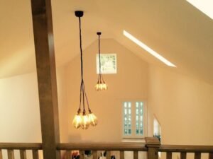 New-Build Interior Painting with a Vaulted Stairwell