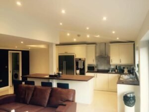 Coordinated Home Interiors with Navy and Neutral Finishes